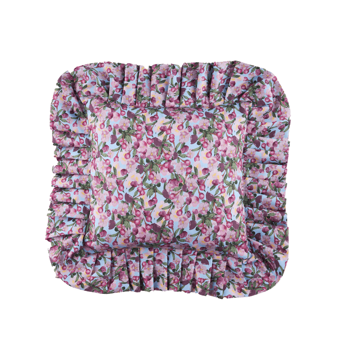 Full view of the Romance Is Dead Organic Cotton Ruffled Pillow Cover in Blue
