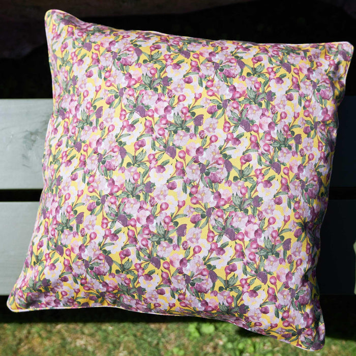 Close-up of the Romance Is Dead Organic Cotton Square Pillow Cover in Yellow print