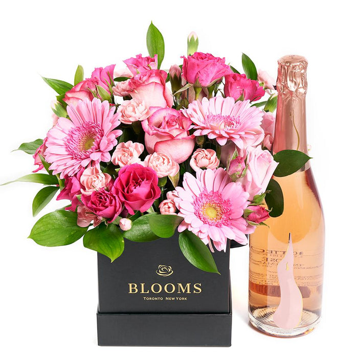 Sparkling Wine Gift Featuring Pink Roses and Mini Carnations in Designer Hat Box – gift basket with to make it truly unforgettable, this arrangement
