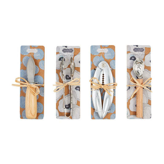 Stainless steel and wood seafood utensil.