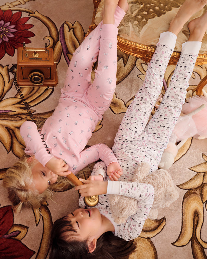 Two children wearing Eloise Adventures Pima cotton pajama set