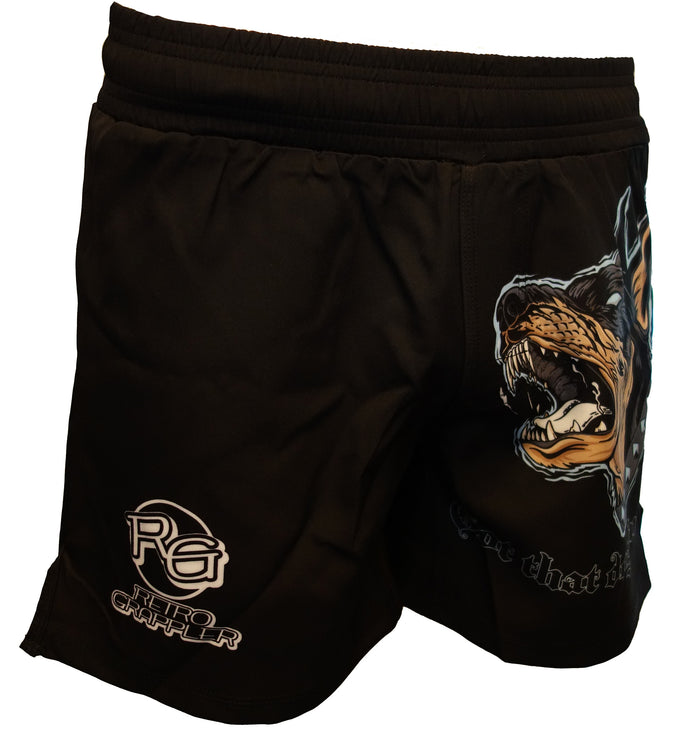 Black lightweight That Dog Grappling Shorts by Retro Grappler, featuring a stylized dog graphic, plus white RG and Retro Grappler logos—ideal for jiu-jitsu training or competition.