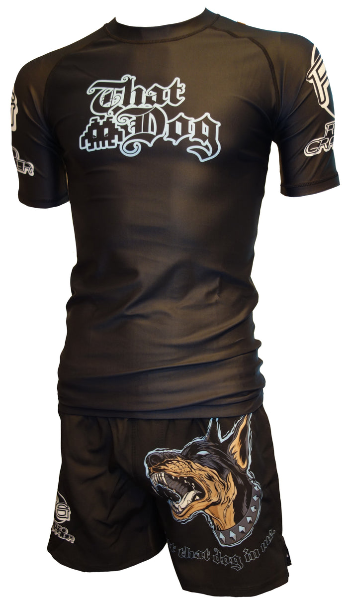 Retro Grapplers That Dog Grappling Shorts feature a lightweight, black athletic design with aggressive dog graphics, white logos, an elastic waistband, and bold That Dog text on the matching shirt.