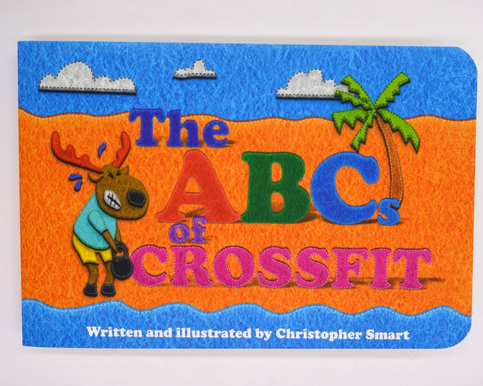 The ABCs of CrossFit Baby Book by Retro Grappler is a colorful childrens book introducing fitness concepts, featuring a cartoon moose lifting a kettlebell, a palm tree, and clouds. Written and illustrated by Christopher Smart.