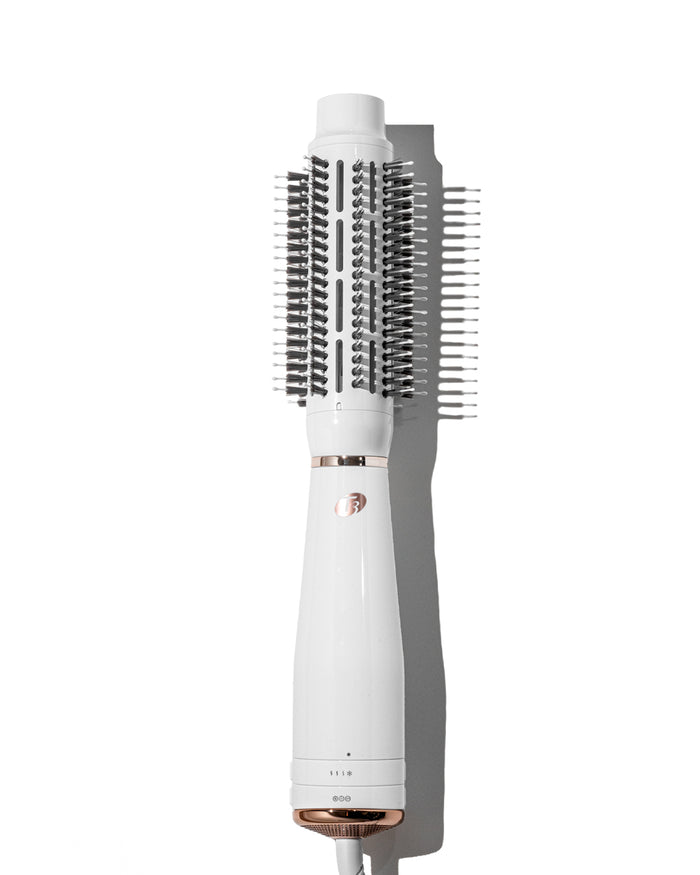 White and rose gold hair styling tool on a white background