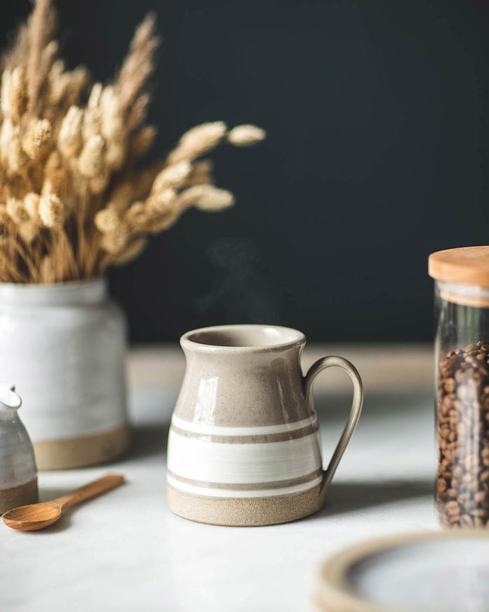 Yellowware Stoneware Mug — mug beside a jar of coffee; Farmhouse Pottery